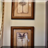 A42. Framed palm trees prints.